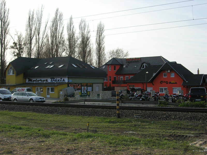 23835